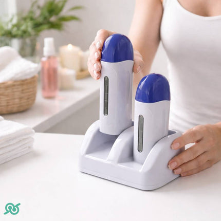Riscaldatore per cera con due manipoli roll-on e con la base per la depilazione